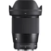 Combining a comfortable wide-angle design with an ultra-fast maximum aperture, the 16mm f/1.4 DC DN is part of Sigma's Contemporary series of lenses and designed for use with Nikon Z-mount mirrorless cameras. Characterized by its bright f/1.4 maximum aperture, this lens is adept at working in low-light conditions and also affords increased control over depth of field for selective focus control. The optical design makes use of several low dispersion and aspherical elements, which control color fringing and various aberrations in order to provide high sharpness and clarity throughout the aperture range. Individual elements also feature a super multilayered coating to suppress flare and ghosting for greater contrast and color fidelity when working in strong lighting conditions. Benefitting the optical assets, this lens also sports a stepping AF motor for quick, quiet, and smooth focusing performance that suits both still photography as well as video applications. As part of the Contemporary line within Sigma's Global Vision series, this lens is designed to achieve a balance between convenience and performance, and meshes a compact, lightweight build and versatile handling with notable optical attributes. Wide-angle prime is designed for APS-C-format Nikon Z-mount mirrorless cameras and provides a 24mm equivalent focal length. Bright f/1.4 maximum aperture excels in low-light conditions and also affords increased control over depth of field for achieving selective focus effects. Two special low dispersion (SLD) elements and three F low dispersion (FLD) elements reduce color fringing and chromatic aberrations in order to achieve greater clarity and color accuracy. Two aspherical elements are used to limit distortion and spherical aberrations and also contribute to greater overall sharpness and accurate rendering. A super multilayered coating has been applied to lens elements in order to minimize lens flare and ghosting and contribute to producing contrast-rich and color-neutral imagery, even in backlit conditions. A stepping AF motor benefits both photographers and videographers with its fast, precise, and near-silent performance. Rounded nine-blade diaphragm contributes to a smooth and pleasing bokeh quality. The bayonet mount is constructed from brass to ensure accuracy and durability. Additionally, rubber sealing in the mount design renders it dust and splash resistant.